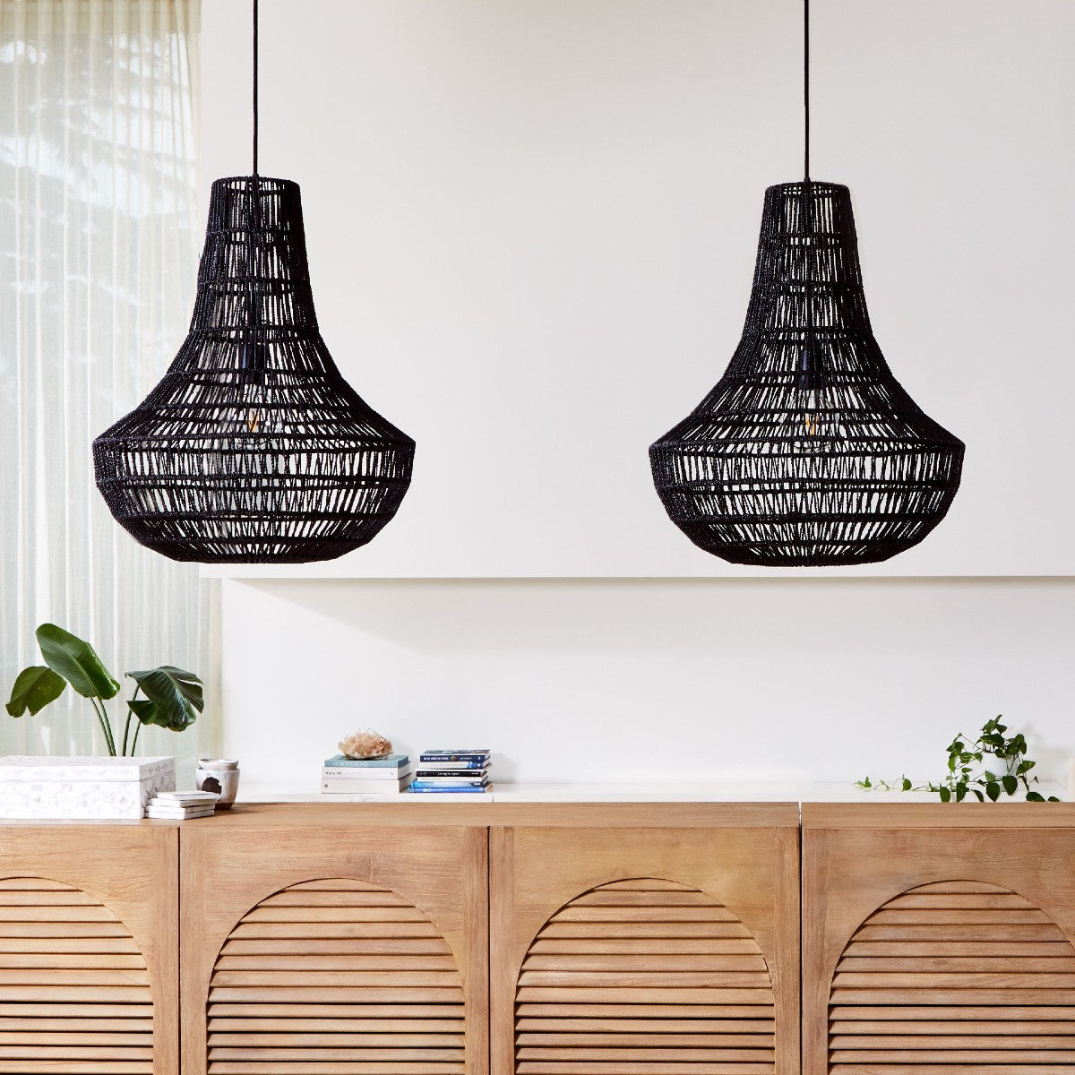 Hamptons pendant light chandeleir. 2 Burleigh light shades hanging above an elm arched side table.