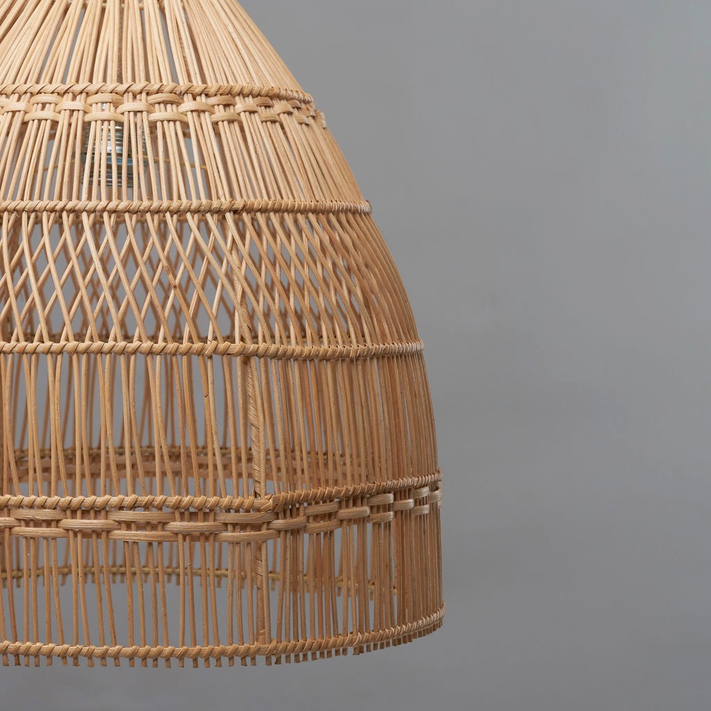 Mediterranean style pendant light. close up shows the detail in the weave of the light shade.