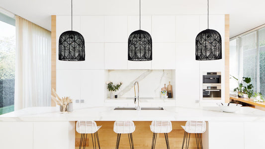 black handcrafted dome shaped lights over a kitchen bench