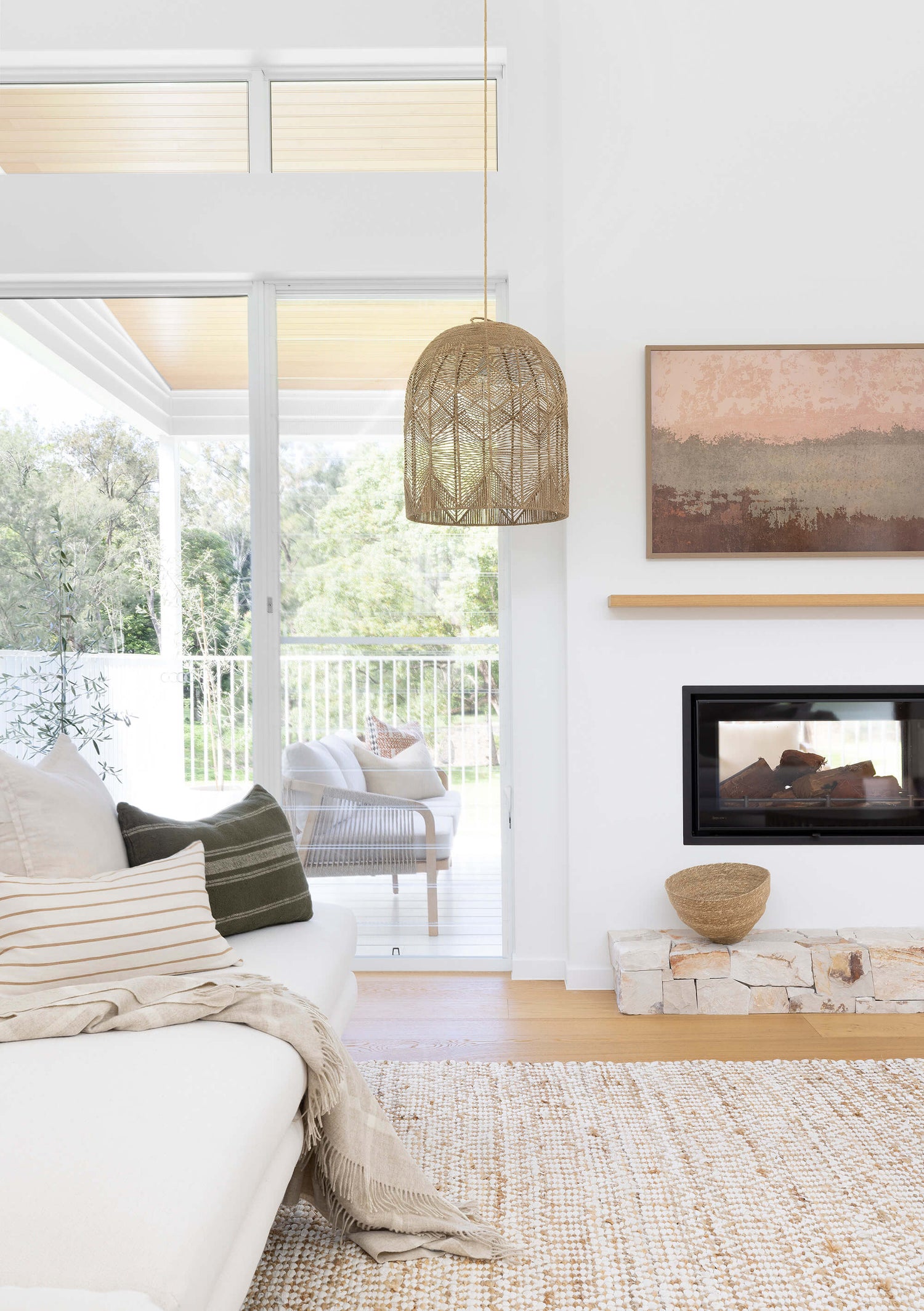 Airlie living room pendant light hanging in a modern hosue.
