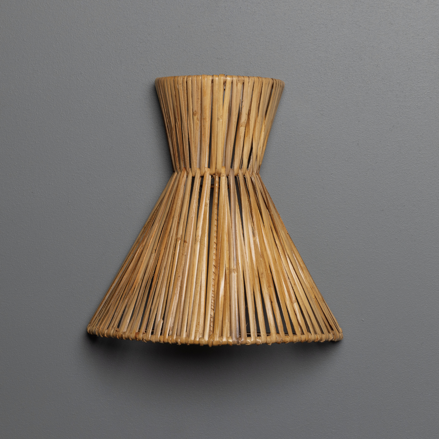 Rattan wall sconce