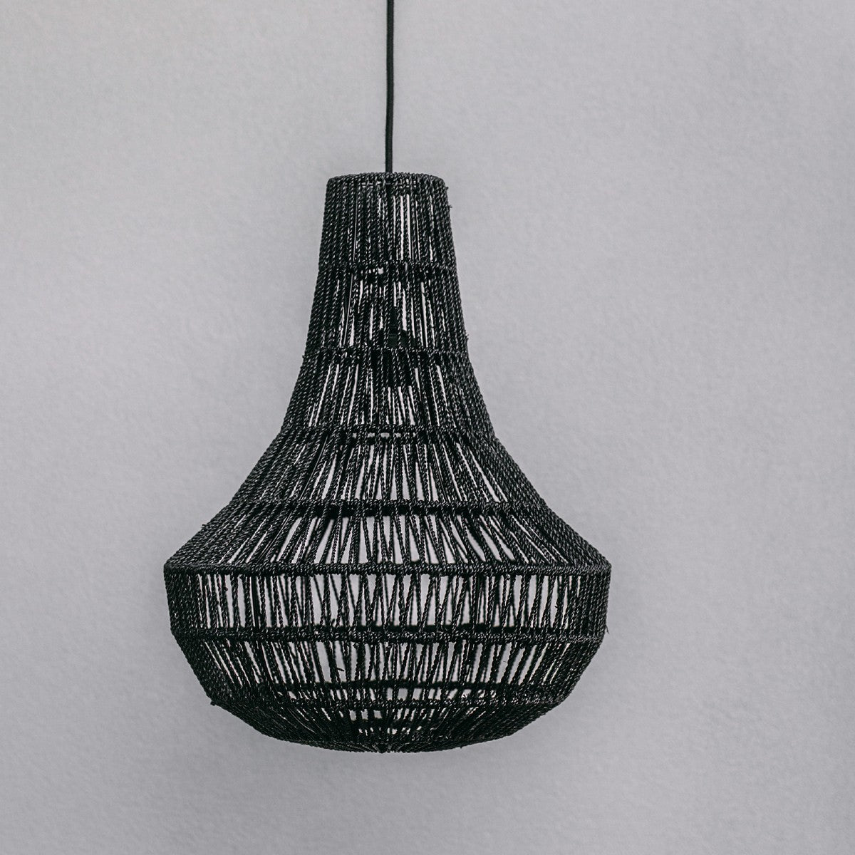 Seagrass Hamptons pendant light. Burliegh pendant phtographes against a grey back ground to enable you to see the detail in the light shade.