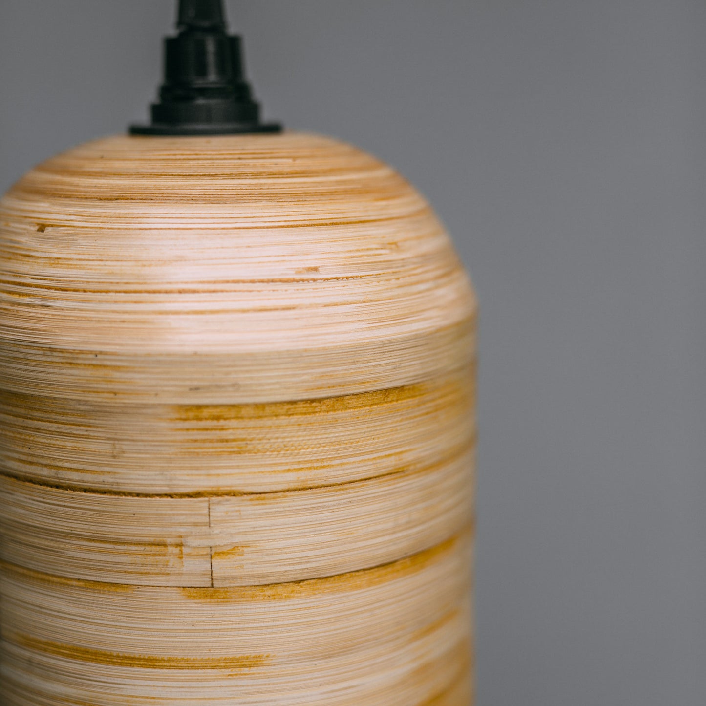 Close-up-of-coastal-style-lighting-small-bamboo-pendant-light-shade