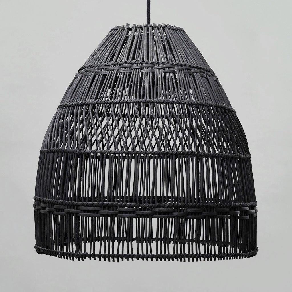 black rattan pendant light. photo fo the light shade against a plain grey background enables you to see the pattern in the weave of the light shade.