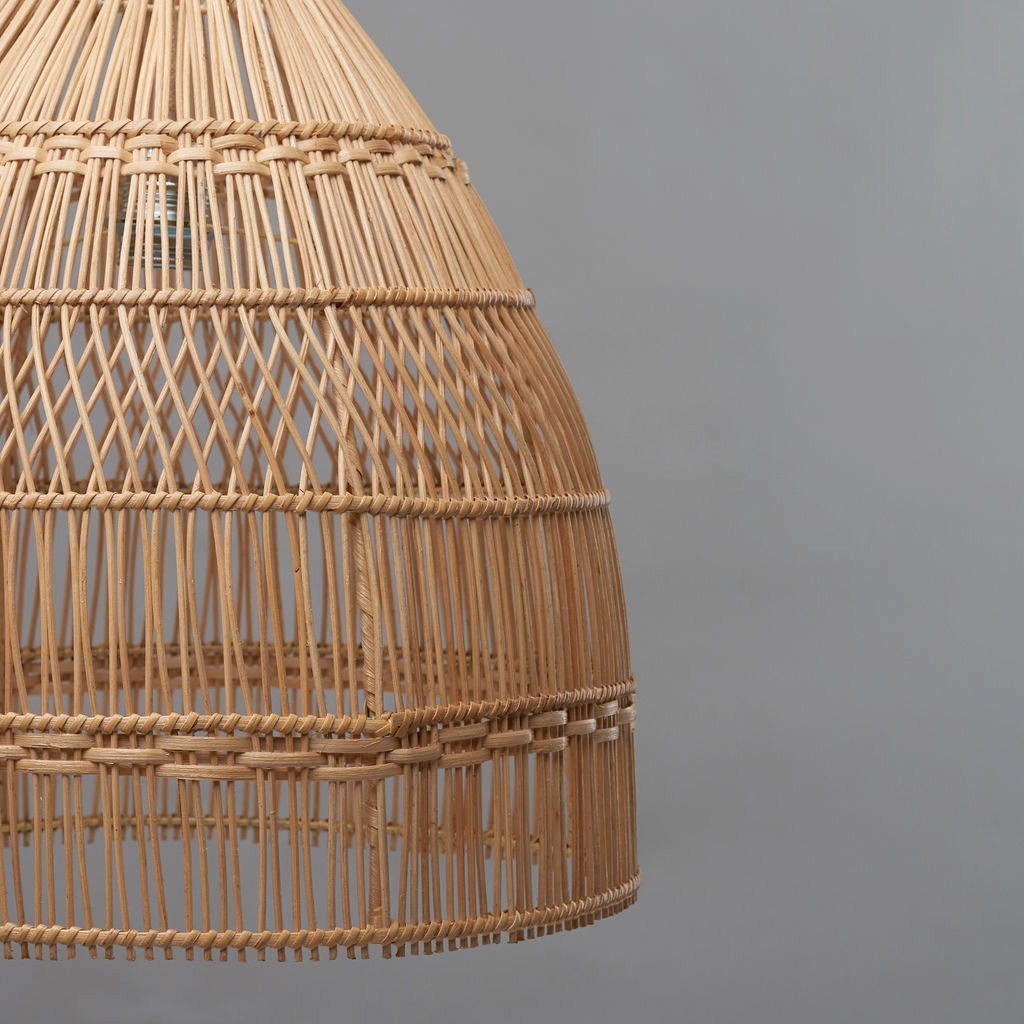 Mediterranean style pendant light. close up shows the detail in the weave of the light shade.
