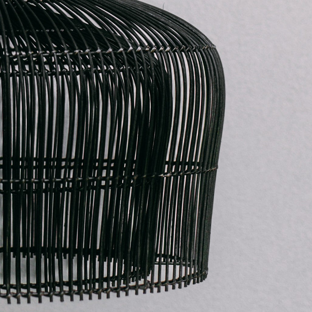 Close-up-photo-of-Double-layered-black-rattan-pendant-light-showing-detail