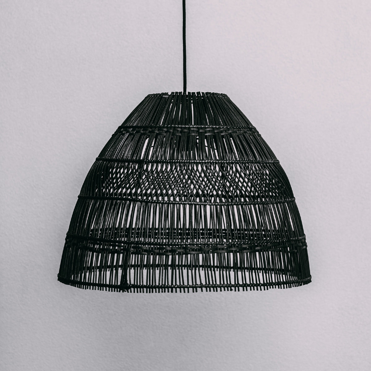 Rattan pendant light. Black-rattan-pendant-light-with-straight-and-diamond-weave-design